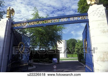 Stock Photo -  Europe, Luxembourg, Entrance gate to the American Cemetery and Memorial. World War II, . Fotosearch