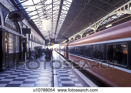 Picture -  Europe, Republic of Ireland, Ireland, Dublin. Passenger train waiting for people to board at Heuston Station in Dublin in County Dublin.. Fotosearch