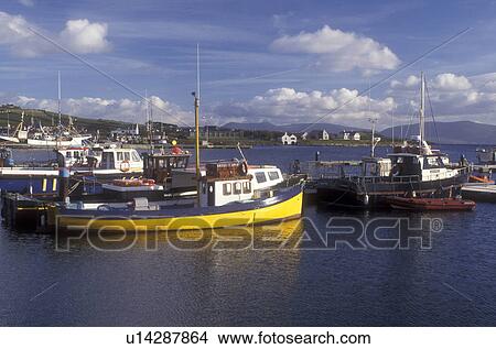 Europe, Republic of Ireland, Ireland, Dindle, Fishing boats docked in harbor in the town of Dingle in County Kerry. View Large Photo Image Picture - Europe, Republic of Ireland, Ireland, Dindle, Fishing boats docked in harbor in the town of Dingle in County Kerry.. Fotosearch