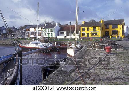 Europe, Republic of Ireland, Ireland, Boats docked in Kinvarra Bay in the colorful quaint town of Kinvarra in County Galway. View Large Photo Image Stock Image - Europe, Republic of Ireland, Ireland, Boats docked in Kinvarra Bay in the colorful quaint town of Kinvarra in County Galway.. Fotosearch