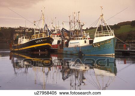 Stock Photography -  Europe, Republic of Ireland, Ireland, Kinsale, Fishing boats docked in Kinsale Harbor in County Cork. . Fotosearch