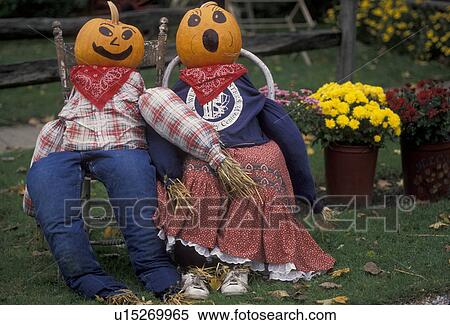 fall, decoration, Vermont, pumpkins, A fall decoration of a scarecrow couple with pumpkinheads are displayed in Montgomery Center. View Large Photo Image Stock Photography - fall, decoration, Vermont, pumpkins, A fall decoration of a scarecrow couple with pumpkinheads are displayed in Montgomery Center.. Fotosearch