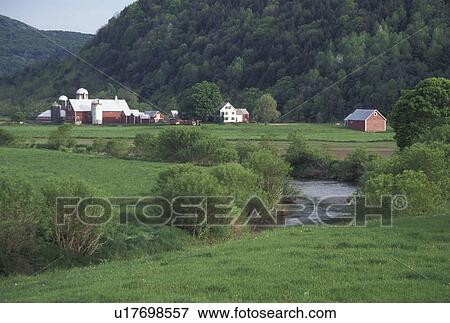 Stock Photo -  farm, river, Vermont, VT, Scenic view of a farm along the First Branch White River in Tunbridge in the spring. . Fotosearch