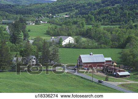 Picture -  farm, Vermont, VT, Scenic view of a farm with a red barn and the beautiful countryside in Pomfret in the spring.. Fotosearch