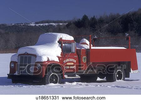 fire truck, Vermont, A snow covered red antique fire truck parked in a field of snow in winter in Riverton in Washington County in the state of Vermont View Large Photo Image Stock Image - fire truck, Vermont, A snow covered red antique fire truck parked in a field of snow in winter in Riverton in Washington County in the state of Vermont . Fotosearch