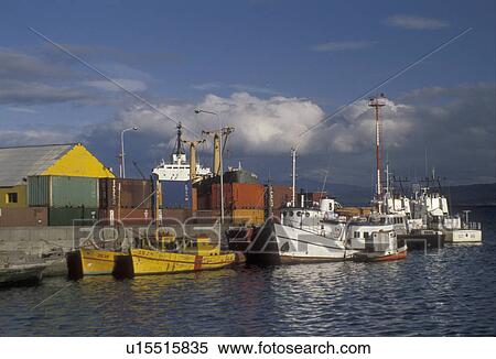 fishing boats, Patagonia, Tierra del Fuego, Argentina, Ushuaia, Andes, Fishing boats are docked on a pier in the harbor of the world's southernmost town of Ushuaia in Argentina. View Large Photo Image Stock Photography - fishing boats, Patagonia, Tierra del Fuego, Argentina, Ushuaia, Andes, Fishing boats are docked on a pier in the harbor of the world's southernmost town of Ushuaia in Argentina. . Fotosearch