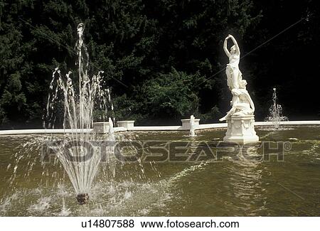 Stock Photo -  fountain, Saratoga Springs, New York, Sculpture in a fountain in the gardens at Yaddo in Saratoga Springs in the state of New York. . Fotosearch