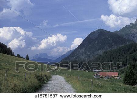 France, Alps, mountains, trail, hiking, Europe, Scenic view of mountains and valley along the GR5 trail in Val Montjoie. View Large Photo Image Stock Photo - France, Alps, mountains, trail, hiking, Europe, Scenic view of mountains and valley along the GR5 trail in Val Montjoie.. Fotosearch