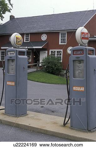 gas pump, antique, collectible, Pennsylvania, Two antique gas pumps on display in front of Old Village Store in Bird in Hand in Lancaster County. View Large Photo Image Stock Photo - gas pump, antique, collectible, Pennsylvania, Two antique gas pumps on display in front of Old Village Store in Bird in Hand in Lancaster County.. Fotosearch