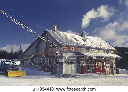 gas station, Vermont, VT, Gas station and garage with antique gas pumps in the village of Orange in the snow in winter. View Large Photo Image Stock Photo - gas station, Vermont, VT, Gas station and garage with antique gas pumps in the village of Orange in the snow in winter. . Fotosearch