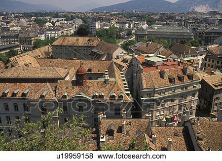 Stock Photo -  Geneva, Switzerland, Europe, Aerial view of the city of Geneva and it's old town (Vielle Ville) rooftops from the tower of Cathedrale de St. -Pierre.. Fotosearch