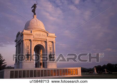 Gettysburg, battlefield, Gettysburg Military Park, Pennsylvania, Pennsylvania Memorial (a four-arched granite monument) in the early morning light on Cemetery Ridge at Gettysburg National Military Park in Gettysburg in the state of Pennsylvania. View Large Photo Image Stock Image - Gettysburg, battlefield, Gettysburg Military Park, Pennsylvania, Pennsylvania Memorial (a four-arched granite monument) in the early morning light on Cemetery Ridge at Gettysburg National Military Park in Gettysburg in the state of Pennsylvania.. Fotosearch