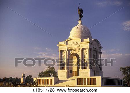 Gettysburg, battlefield, monument, Gettysburg Military Park, Pennsylvania, Pennsylvania Memorial (a four-arched granite monument) on Cemetery Ridge in the early morning light at Gettysburg National Military Park in Gettysburg in the state of Pennsylvania View Large Photo Image Stock Photo - Gettysburg, battlefield, monument, Gettysburg Military Park, Pennsylvania, Pennsylvania Memorial (a four-arched granite monument) on Cemetery Ridge in the early morning light at Gettysburg National Military Park in Gettysburg in the state of Pennsylvania. Fotosearch