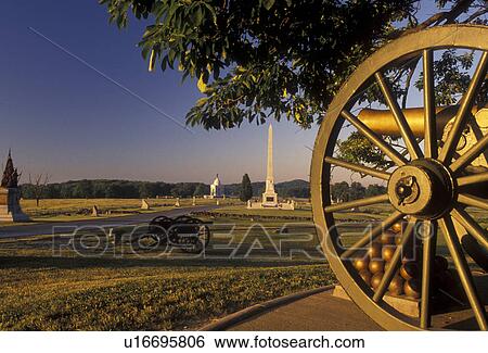 Stock Photograph -  Gettysburg, cannon, battle, battlefield, civil war, Gettysburg Military Park, Pennsylvania, Cannons and monuments at High Water Mark a battlefield site in Gettysburg National Military Park in Gettysburg in the state of Pennsylvania.. Fotosearch
