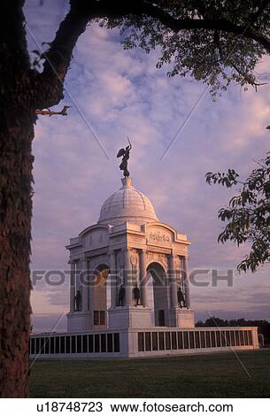 Gettysburg, civil war, battlefield, Gettysburg Military Park, Pennsylvania, Pennsylvania Memorial (a four-arched granite monument) at sunrise on Cemetery Ridge at Gettysburg National Military Park in Gettysburg in the state of Pennsylvania. View Large Photo Image Stock Image - Gettysburg, civil war, battlefield, Gettysburg Military Park, Pennsylvania, Pennsylvania Memorial (a four-arched granite monument) at sunrise on Cemetery Ridge at Gettysburg National Military Park in Gettysburg in the state of Pennsylvania.. Fotosearch