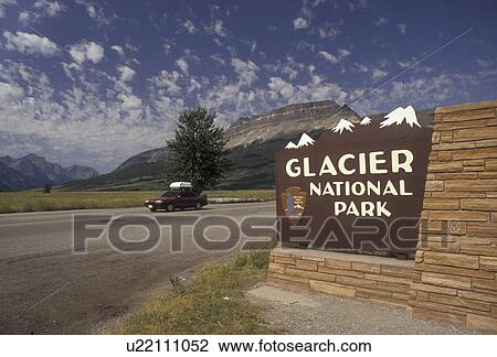 Glacier National Park, Montana, sign, Waterton-Glacier International Peace Park, Rocky Mountains, Entrance sign to Glacier National Park in the state of Montana. View Large Photo Image Stock Image - Glacier National Park, Montana, sign, Waterton-Glacier International Peace Park, Rocky Mountains, Entrance sign to Glacier National Park in the state of Montana.. Fotosearch