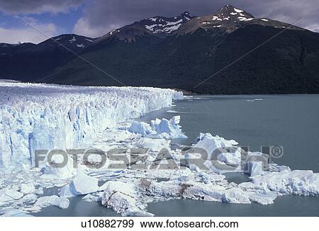 Stock Photo -  glaciers, Patagonia, Argentina, Andes, Moreno Glacier rises 60 meters above lake level in Parque Nacional de los Glaciares (National Park) in Patagonia. Andes Mountains in the background. . Fotosearch