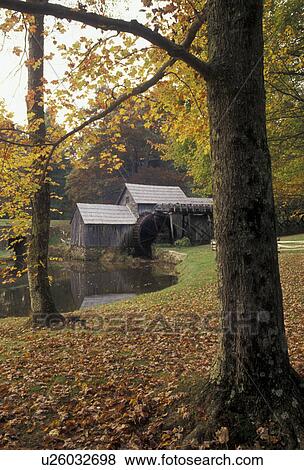 Stock Photo -  grist mill, Mabry Mills, Blue Ridge Parkway, Virginia, Appalachian Mountains, Blue Ridge, Scenic grist mill along the Blue Ridge Parkway in the fall in the state of Virginia.. Fotosearch
