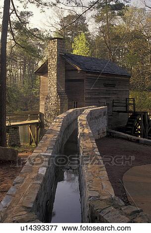 grist mill, Stone Mountain, Atlanta, Stone Mountain Park, Georgia, Trough of water running to the Grist Mill at Georgia's Stone Mountain Park near Atlanta in the state of Georgia. View Large Photo Image Stock Photo - grist mill, Stone Mountain, Atlanta, Stone Mountain Park, Georgia, Trough of water running to the Grist Mill at Georgia's Stone Mountain Park near Atlanta in the state of Georgia.. Fotosearch
