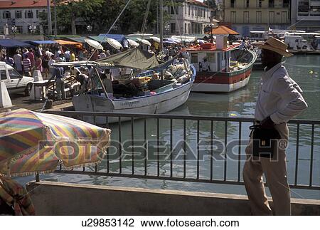 Guadeloupe, Caribbean, Caribbean Islands, Fishing boats along the Darse in Pointe-a-Pitre on the island of Grand Terre in Guadeloupe (a french department) The Emerald Isle. View Large Photo Image Stock Image - Guadeloupe, Caribbean, Caribbean Islands, Fishing boats along the Darse in Pointe-a-Pitre on the island of Grand Terre in Guadeloupe (a french department) The Emerald Isle.. Fotosearch