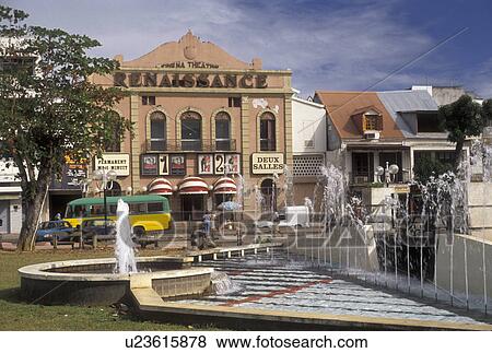 Stock Photo -  Guadeloupe, Caribbean, Caribbean Islands, Fountain and theater at Place de la Victoire in downtown Pointe-a-Pitre on the island of Grand Terre in Guadeloupe (a french department) The Emerald Isle.. Fotosearch