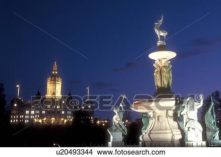 Hartford, State Capitol, State House, Connecticut, The State Capitol of Hartford, Connecticut from the Corning Fountain illuminated at night in Bushnell Park. View Large Photo Image Picture - Hartford, State Capitol, State House, Connecticut, The State Capitol of Hartford, Connecticut from the Corning Fountain illuminated at night in Bushnell Park.. Fotosearch