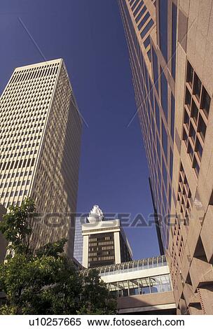 Stock Photography -  high-rise, Charlotte, North Carolina, Looking up a high-rise buildings from street level in downtown Charlotte in the state of North Carolina.. Fotosearch