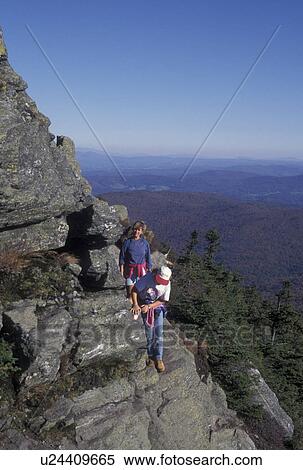 hiking, Vermont, mountain, summit of Camel's Hump in the Green Mountain with a scenic view in Washington County in the state of Vermont. View Large Photo Image Stock Photography - hiking, Vermont, mountain, summit of Camel's Hump in the Green Mountain with a scenic view in Washington County in the state of Vermont. . Fotosearch