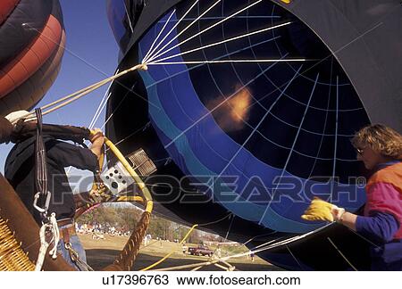 hot air balloon, Atlanta, Georgia, festival, Preparing hot air balloon for lift off at the Atlanta Dogwood Festival in Piedmont Park in Atlanta in the state of Georgia.  View Large Photo Image Stock Image -  hot air balloon, Atlanta, Georgia, festival, Preparing hot air balloon for lift off at the Atlanta Dogwood Festival in Piedmont Park in Atlanta in the state of Georgia. . Fotosearch