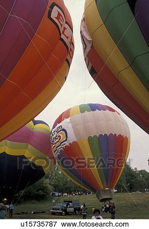 Stock Photo -  hot air balloons, Atlanta, Georgia, Hot air balloon race at the Dogwood Festival in Piedmont Park in Atlanta.. Fotosearch