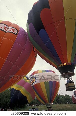 Stock Photo -  hot air balloons, Atlanta, Georgia, Hot air balloon race at the Dogwood Festival in Piedmont Park in Atlanta.. Fotosearch