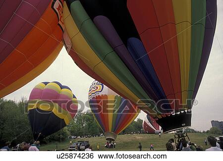 Stock Photograph -  hot air balloons, Atlanta, Georgia, Hot air balloon race at the Dogwood Festival in Piedmont Park in Atlanta.. Fotosearch