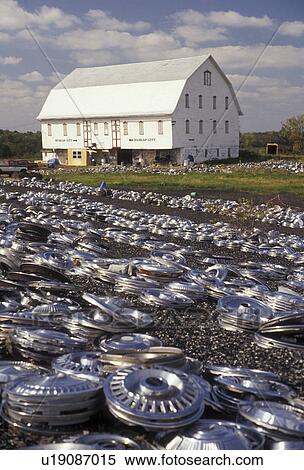 hubcap, Pennsylvania, An abundance of hub caps for sale on the lawn in front of a barn in Abbottstown in the state of Pennsylvania View Large Photo Image Stock Photography - hubcap, Pennsylvania, An abundance of hub caps for sale on the lawn in front of a barn in Abbottstown in the state of Pennsylvania . Fotosearch