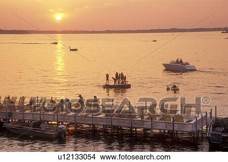 Picture -  Iowa, Arnold Park, [Sunrise, sunset] over West Okoboji Lake on Fillenwarth Beach in Arnold Park.. Fotosearch