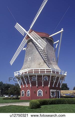 Stock Image -  Iowa, Orange City, windmill, A Danish style windmill is used for a bank in Orange City.. Fotosearch