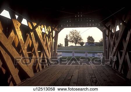 Stock Photo -  Iowa, St. Charles, covered bridge, Interior of Ives Covered Bridge circa 1870 in St. Charles. Bridges of Madison County.. Fotosearch