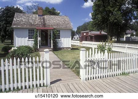 Iowa, West Branch, white picket fence around Herbert Hoover Birthplace Cottage at the Herbert Hoover National Historic Site in West Branch View Large Photo Image Stock Image - Iowa, West Branch, white picket fence around Herbert Hoover Birthplace Cottage at the Herbert Hoover National Historic Site in West Branch . Fotosearch