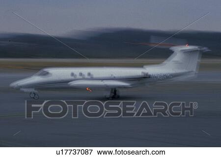 jet, airport, Atlanta, Georgia, Small corporate jet streaks down the runway at Peachtree Dekalb Airport in Atlanta. View Large Photo Image Stock Photo - jet, airport, Atlanta, Georgia, Small corporate jet streaks down the runway at Peachtree Dekalb Airport in Atlanta.. Fotosearch
