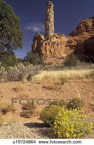 Picture -  Kodachrome Basin, Utah, A pinnacle rock formation stands across a dusty field in Kodachrome Basin State Park in the state of Utah . Fotosearch