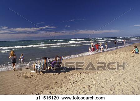 Lake Michigan, Indiana Dunes, beach, Indiana, People enjoying a day on the beach on Lake Michigan at Indiana Dunes National Lakeshore in the state of Indiana. View Large Photo Image Stock Image - Lake Michigan, Indiana Dunes, beach, Indiana, People enjoying a day on the beach on Lake Michigan at Indiana Dunes National Lakeshore in the state of Indiana.. Fotosearch