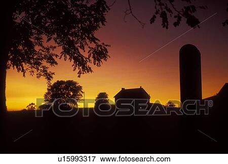 Stock Photo -  Lancaster County, Amish country, silhouette, farm, Pennsylvania, Pennsylvania Dutch Country, A silhouette of an Amish farm at sunset in Lancaster in the state of Pennsylvania. . Fotosearch