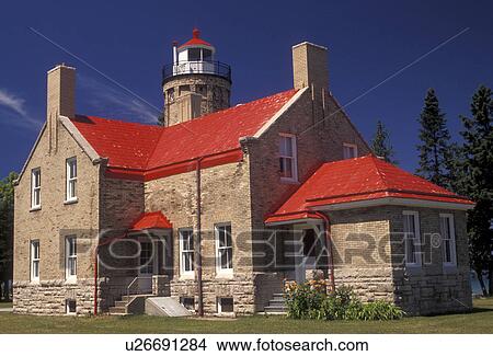 lighthouse, Mackinaw City, Michigan, Scenic view of the 1892 Mackinaw Point Lighthouse with its bright red roof in Mackinaw City in the state of Michigan. View Large Photo Image Picture - lighthouse, Mackinaw City, Michigan, Scenic view of the 1892 Mackinaw Point Lighthouse with its bright red roof in Mackinaw City in the state of Michigan.. Fotosearch