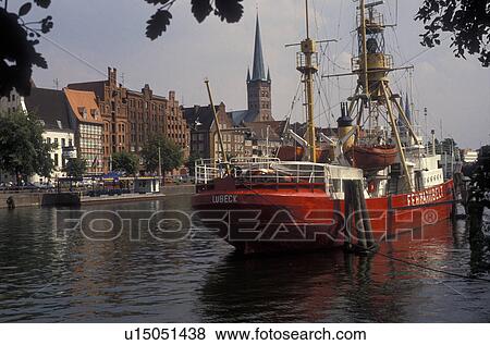 Lubeck, Germany, fire boat, Europe, Red fire boat moored on a dock on a canal in the Medieval Town of Lubeck. View Large Photo Image Stock Photo - Lubeck, Germany, fire boat, Europe, Red fire boat moored on a dock on a canal in the Medieval Town of Lubeck.. Fotosearch