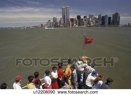 Manhattan, tourboat, New York City, skyline, Statue of Liberty Ferry, N. Y. C New York, NYC, Tourists aboard the Statue of Liberty Ferry headed for Manhattan on Upper New York Bay in New York City in the state of New York. View Large Photo Image Stock Image - Manhattan, tourboat, New York City, skyline, Statue of Liberty Ferry, N. Y. C New York, NYC, Tourists aboard the Statue of Liberty Ferry headed for Manhattan on Upper New York Bay in New York City in the state of New York. . Fotosearch