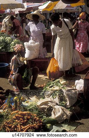 market, Guadeloupe, Caribbean, Caribbean Islands, Local people shopping at street market on Market Day in Pointe-a-Pitre on the island of Grand Terre in Guadeloupe (a French Department) The Emerald Isle. View Large Photo Image Picture - market, Guadeloupe, Caribbean, Caribbean Islands, Local people shopping at street market on Market Day in Pointe-a-Pitre on the island of Grand Terre in Guadeloupe (a French Department) The Emerald Isle.. Fotosearch