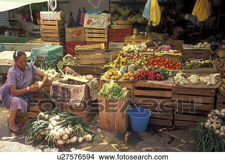 market, Mexico, Taxco, Mexican women selling fresh produce on crates at a street market in the town of Taxco Silver City in the state of Guerrero. Taxco is the oldest mining town in North America. View Large Photo Image Picture - market, Mexico, Taxco, Mexican women selling fresh produce on crates at a street market in the town of Taxco Silver City in the state of Guerrero. Taxco is the oldest mining town in North America.. Fotosearch