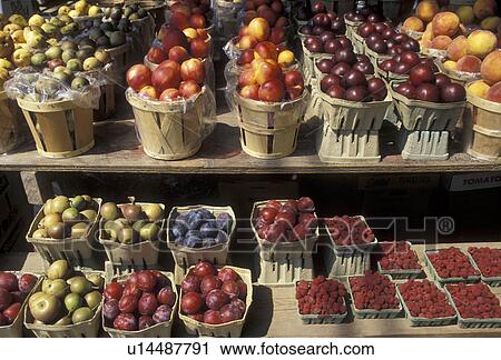 Stock Image -  market, produce, fruits, Fresh local produce for sale at a farm market in Pensylvania Dutch Country in Lancaster County in the state of Pennsylvania. . Fotosearch