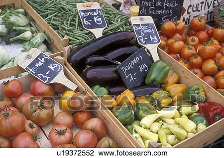 Stock Image -  market, vegetable, Switzerland, Vaud, Europe, Fresh produce is displayed at a market in the village of Morges on market day in the Canton of Vaud.. Fotosearch