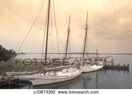 Maryland, Chesapeake Bay Maritime Museum, St. Michaels, Historic boats docked in the harbor at the Chesapeake Bay Maritime Museum in St. Michaels on the Chesapeake Bay in Maryland. View Large Photo Image Stock Image - Maryland, Chesapeake Bay Maritime Museum, St. Michaels, Historic boats docked in the harbor at the Chesapeake Bay Maritime Museum in St. Michaels on the Chesapeake Bay in Maryland.. Fotosearch