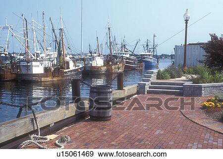 Stock Photo -  Massachusetts, Buzzards Bay, New Bedford, Fishing boats moored at Buzzard's Bay in New Bedford, Massachusetts.. Fotosearch